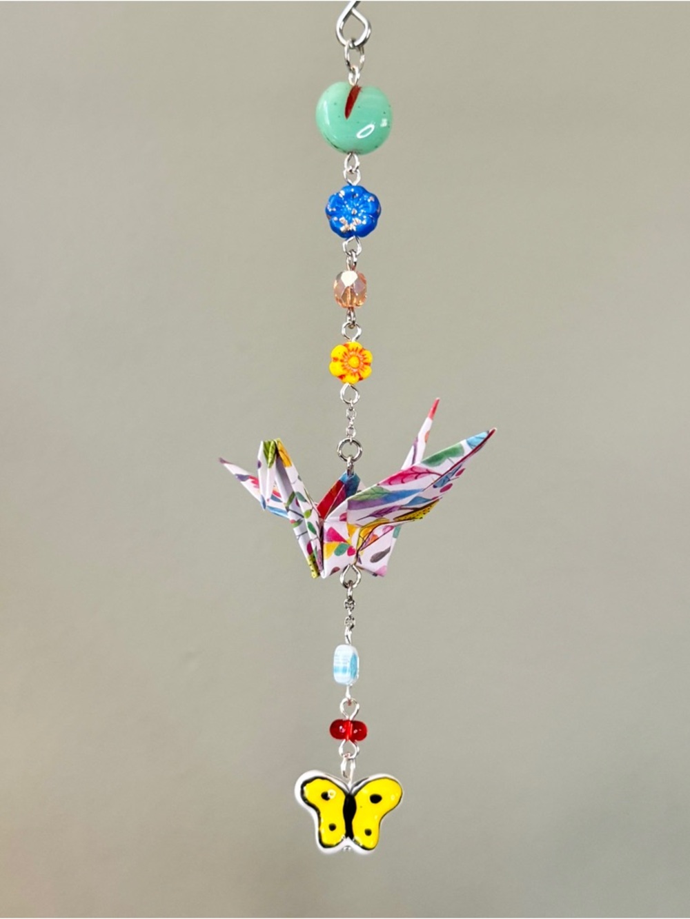 Origami Ornament #2446 - Small Crane with Ceramic Butterfly